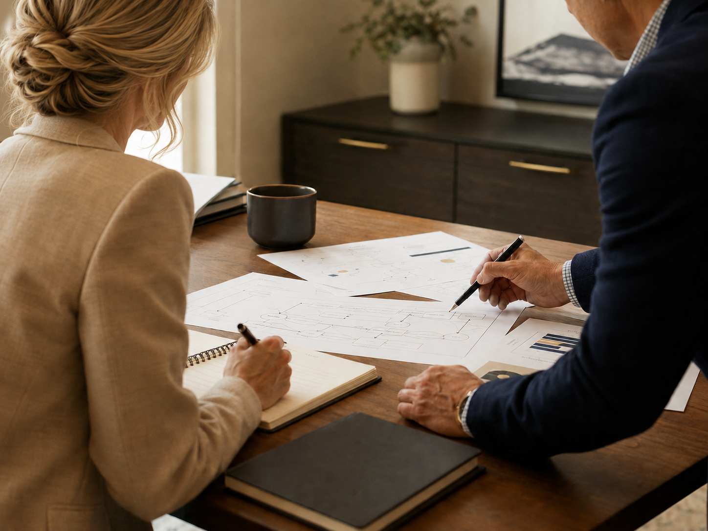 Shanelle Fichter reviewing operational workflows and business processes with a client